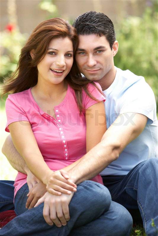 Young Couple In Garden, stock photo