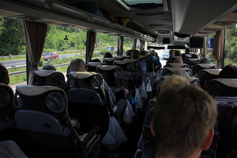 The tour bus with passengers go on holiday in the summer to a foreign country, stock photo