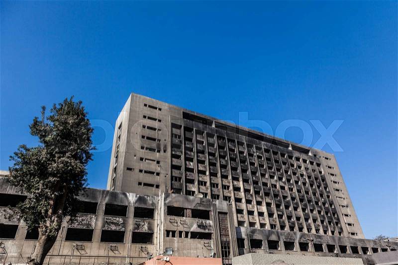CAIRO, EGYPT - JAN 31, 2015: Building of the National Council for Women and the National Democratic Party headquarters burnt during the Egyptian Revolution of January 2011, stock photo