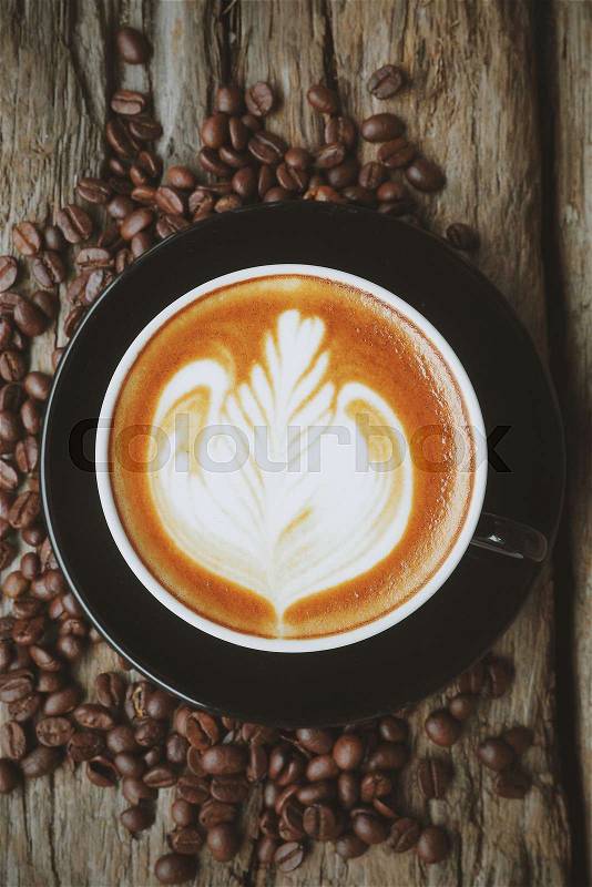 Coffee on the wood texture vintage color tone , stock photo