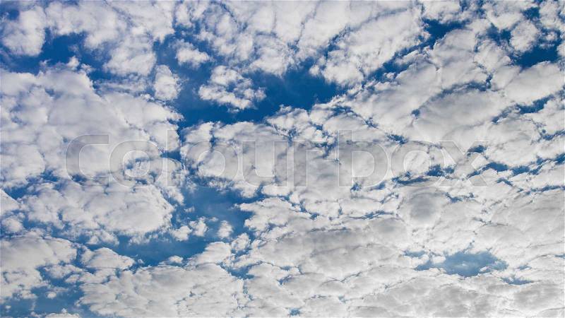 The blue sky with beautiful cumulus clouds, stock photo