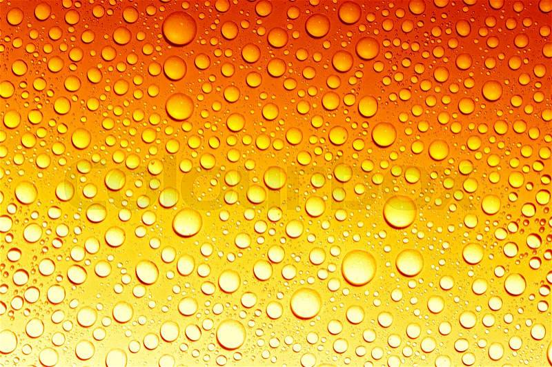 Water drops on beer background , stock photo
