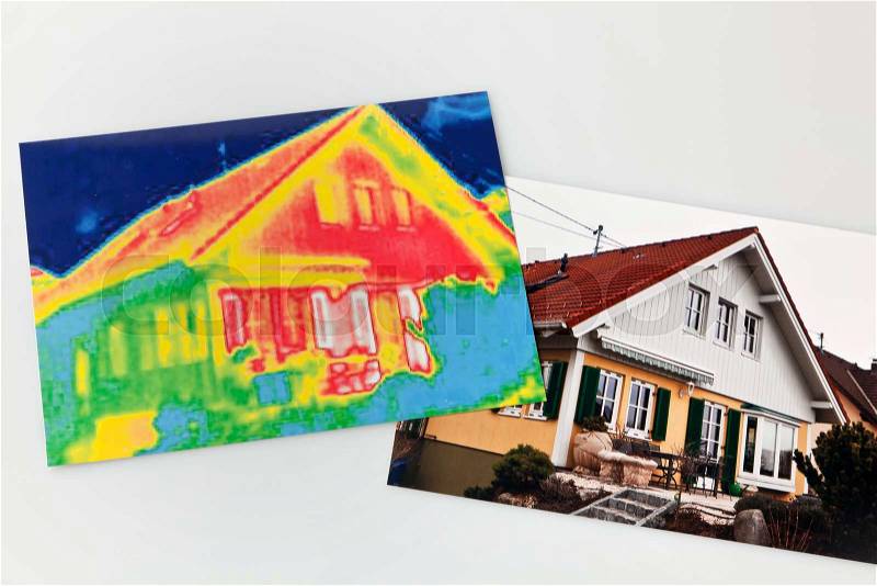 Saving energy through thermal insulation. house with thermal imaging camera, stock photo
