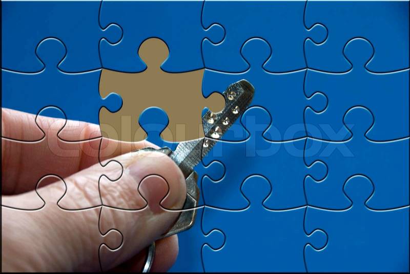 Missing puzzle piece the key to success, stock photo