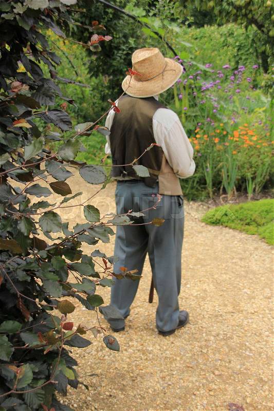 The gardener has fun in the wonderful garden in the summer in England, stock photo