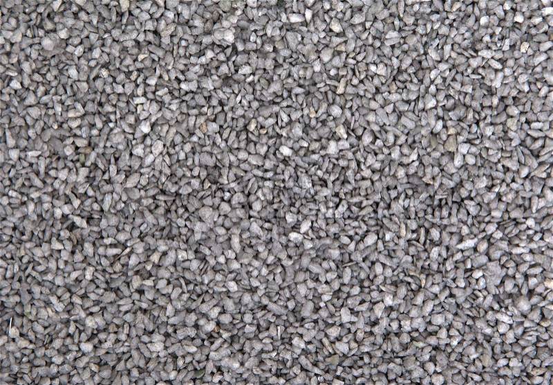 Ground stone, grey, background of many small stones, stock photo