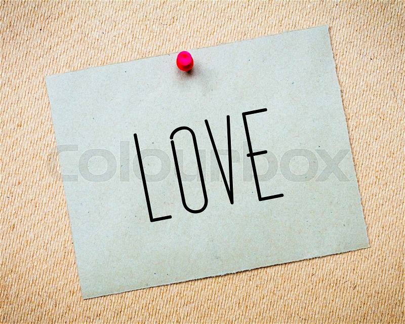 Recycled paper note pinned on cork board.Love Message. Concept Image, stock photo