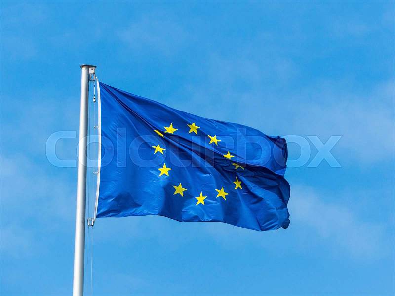 The european union flag blowing in the wind. eu flag, stock photo