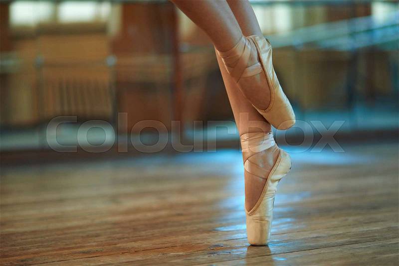 Beautiful legs of a dancer in pointe, stock photo