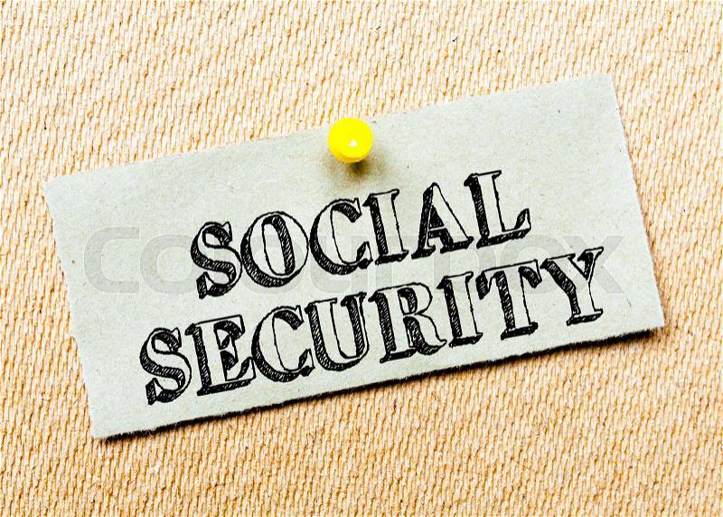Recycled paper note pinned on cork board. Social Security Message. Concept Image, stock photo