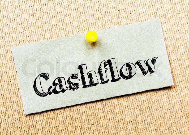 Recycled paper note pinned on cork board. Cashflow Message. Concept Image, stock photo