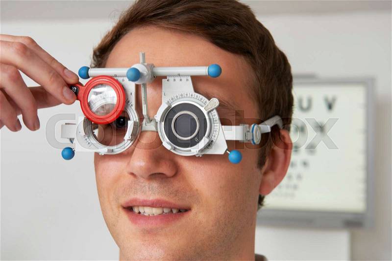 Man Having Sight Test At Optometrist, stock photo