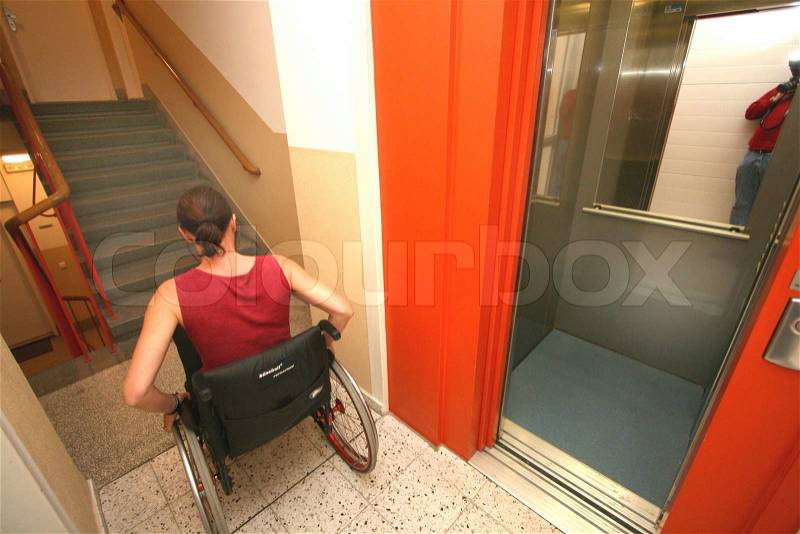 A woman is Gehbenidert. Wheelchairs, stock photo