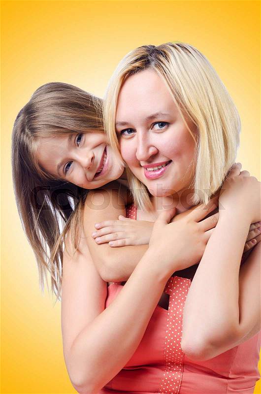 Happy mom and daughter on white, stock photo