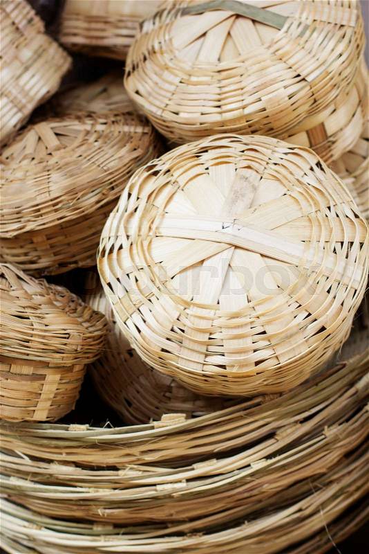 Bamboo baskets for sale in indian market, stock photo