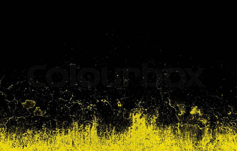 Dynamic bright yellow splashes on a black background, stock photo