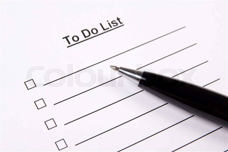 Close up of blank to do list and metal pen, stock photo