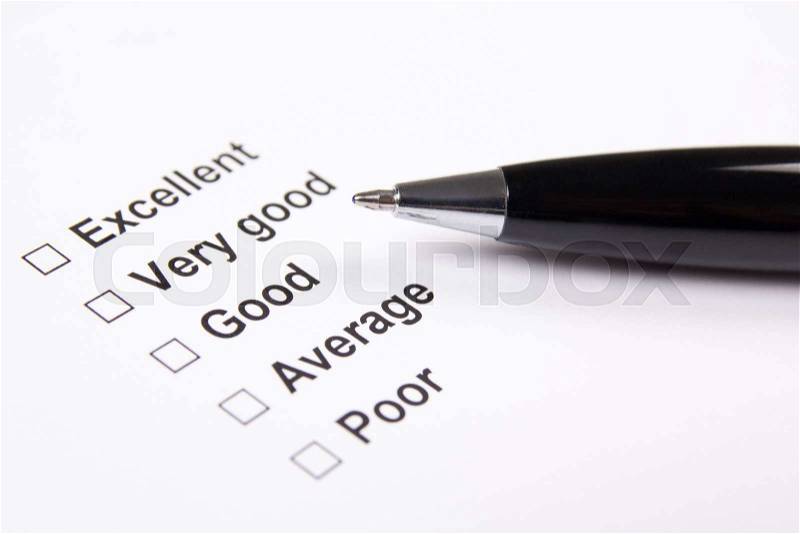 Survey with excellent, very good, good, average and poor answers and metal pen, stock photo