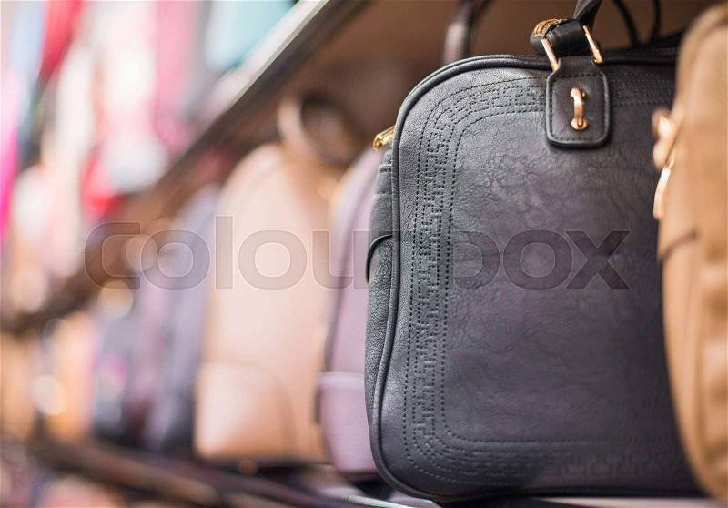 Leather handbags collection in the store, stock photo