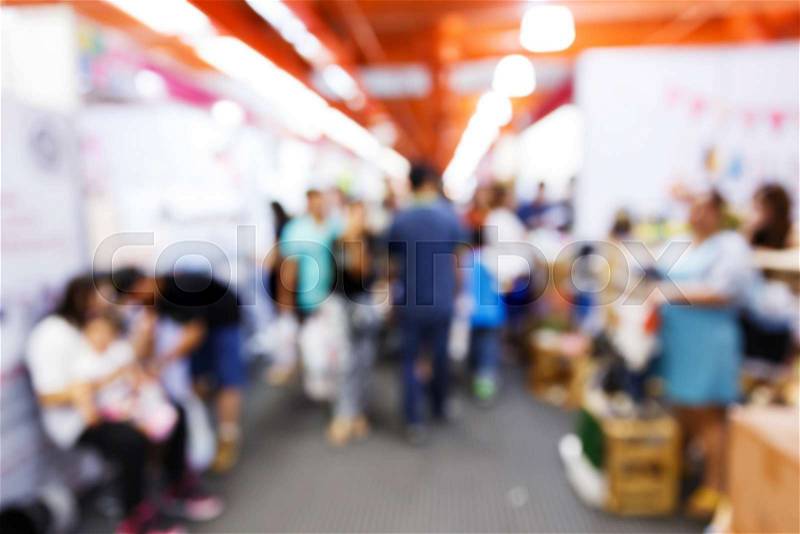 Abstract Blurry soft and out of focus people in shopping center, stock photo