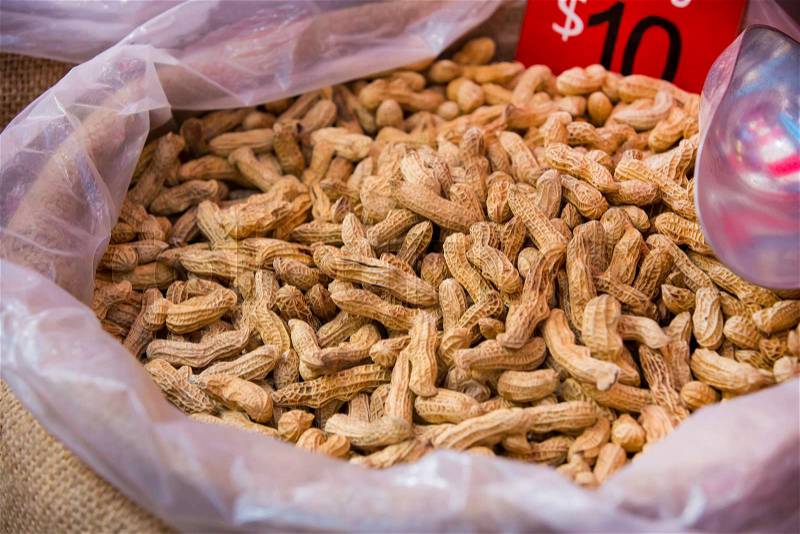 Peanuts in a bag on the market close up shot, stock photo