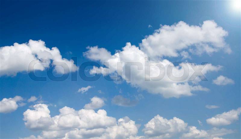 Cloudy sky with bright sunshine, stock photo
