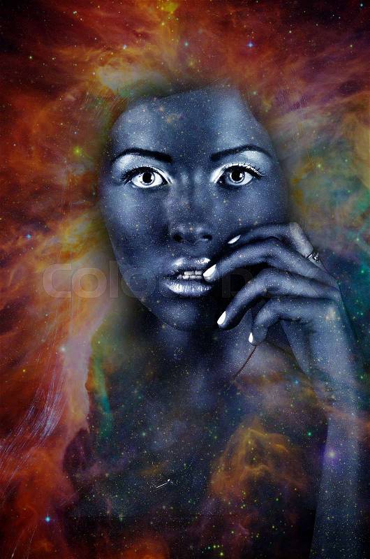 Blue tones portrait of cute woman with dark face art in studio. Starry makeup. Elements of this image furnished by NASA, stock photo