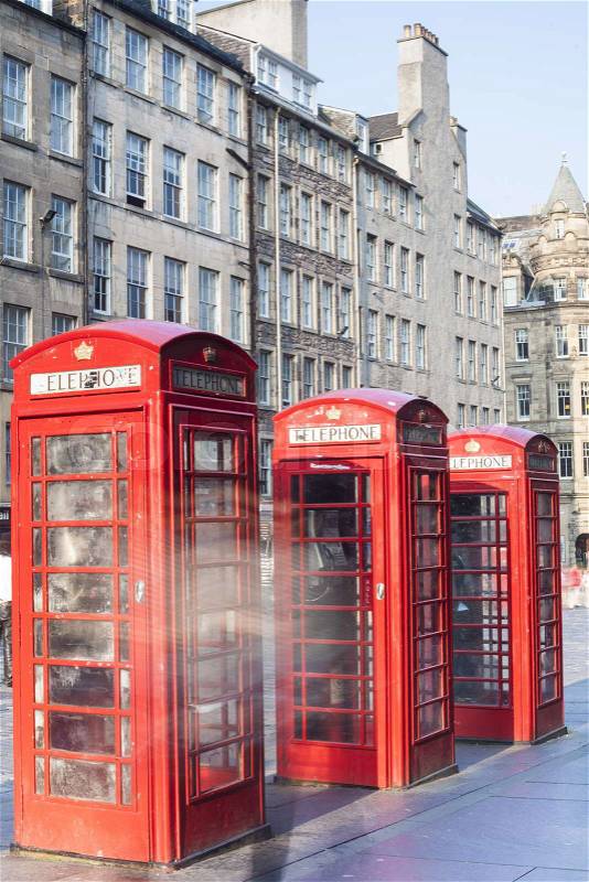 Retro old red telephone booths on Royal mile street in Edinburgh, capital of Scotland, United Kingdom, stock photo