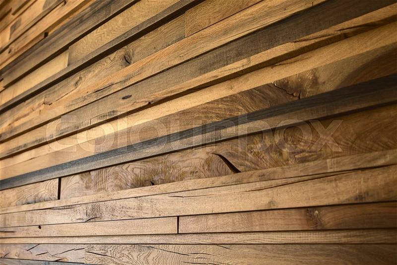 Horizontal rows of wooden yellow oak planks, different sizes. decoration, stock photo