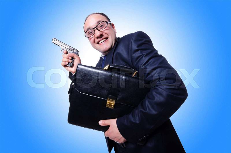 Businessman with gun isolated on white, stock photo