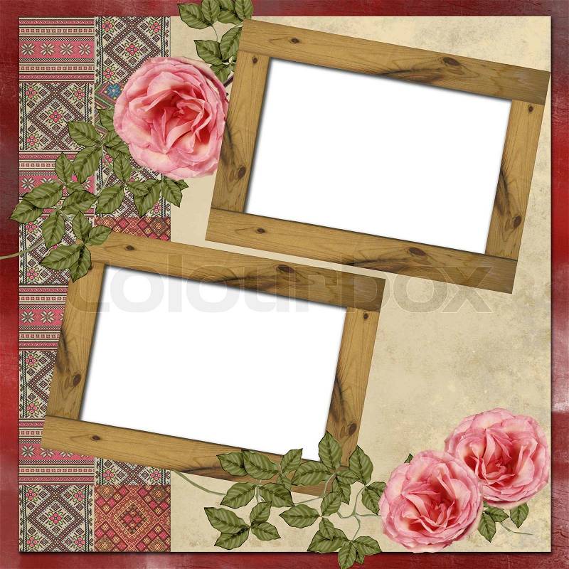 Wooden frames with Ukrainian embroidery and roses on grunge background, stock photo