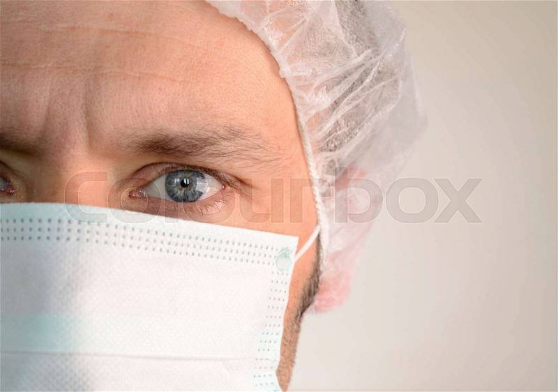 Mature male looking at camera at hospital, close up shot , stock photo