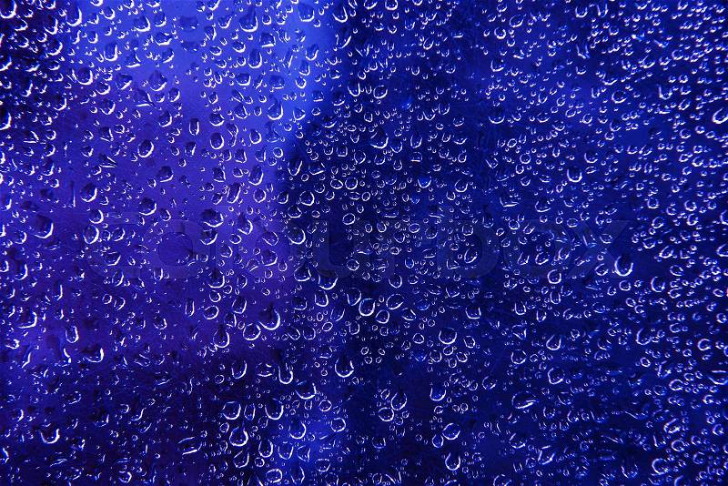 Blue Water Beads Background. Blue Wet Glass Photo Backdrop, stock photo