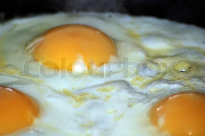 Fried eggs, stock photo