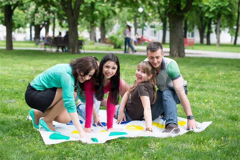 Students play a game in the park twister, beautiful, indoor, little, happy, kindergarten, stock photo