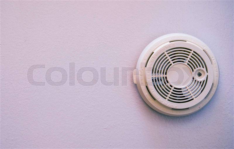 Residential Smoke Detector Wall Mounted Device. Fire Protection, stock photo