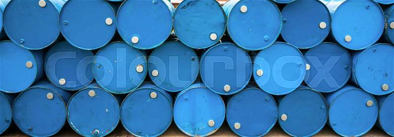 Oil barrels or chemical drums stacked up, stock photo