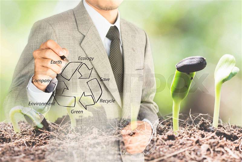 Double exposure business man drawing recycle green conserve environment concept, stock photo