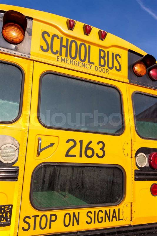 A typical american school bus in yellow color, stock photo