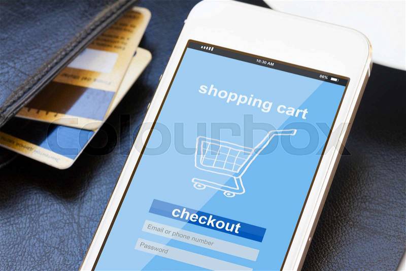 Mobile shopping concept - virtual shop on phone screen with credit cards , stock photo