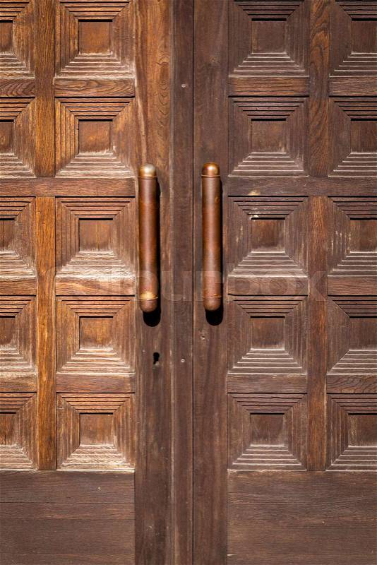 Close-up image of a fragment of wooden ancient door, stock photo