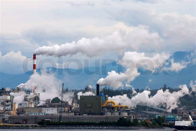 Amazing Alaska. Refinery with smoke stacks, stock photo