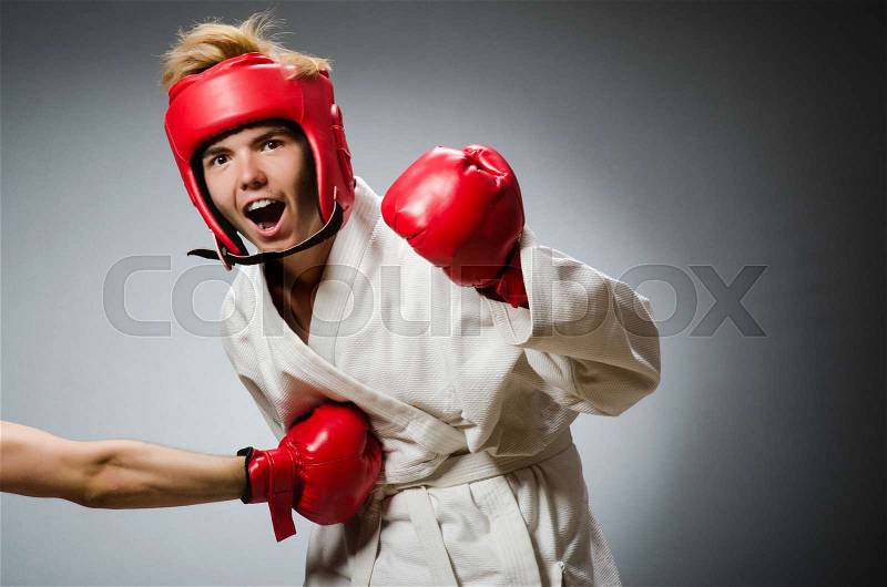Funny boxer in sport concept, stock photo