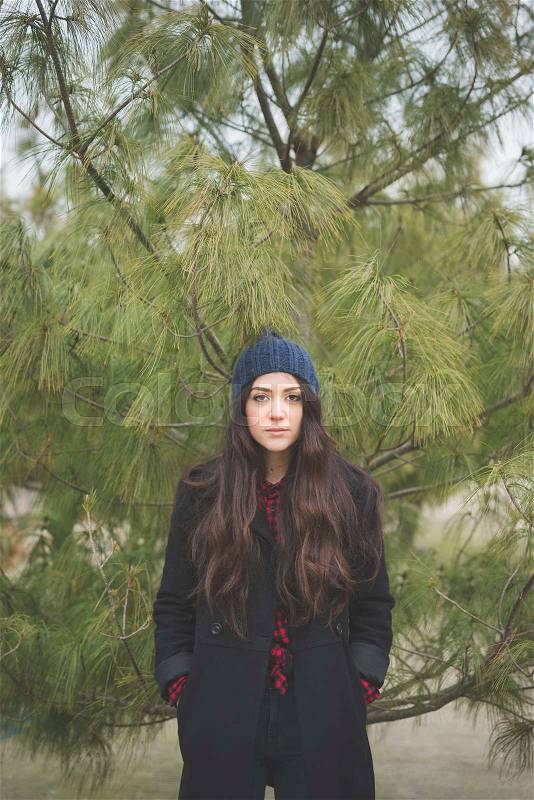 Young beautiful long hair model woman living the city in winter outdoor city, stock photo