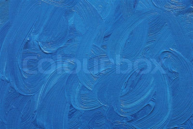Blue oil paint on canvas. NOTE TO INSPECTOR: This is NOT an artwork, this is just some leftover paint on canvas, made by me (no property release needed), stock photo