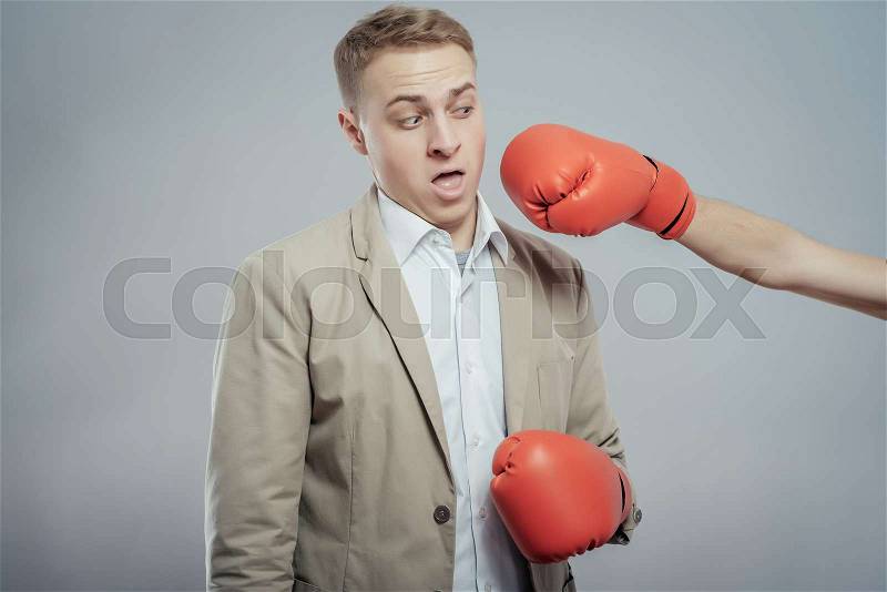 Businessman knockout, stock photo