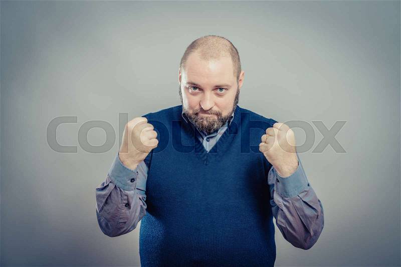 Closeup portrait happy человека, business man winning, fists pumped celebrating success isolated grey wall background. Positive human emotion, facial expression. Life perception, achievement, stock photo