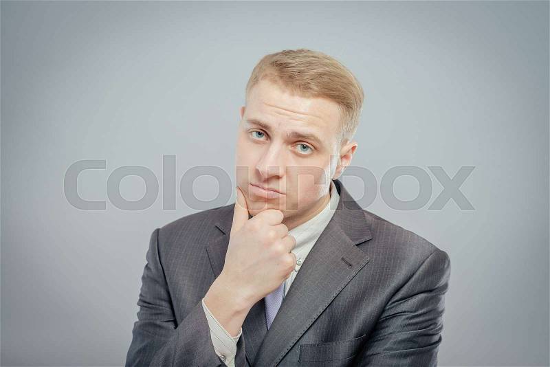 Businessman with sad expression, stock photo