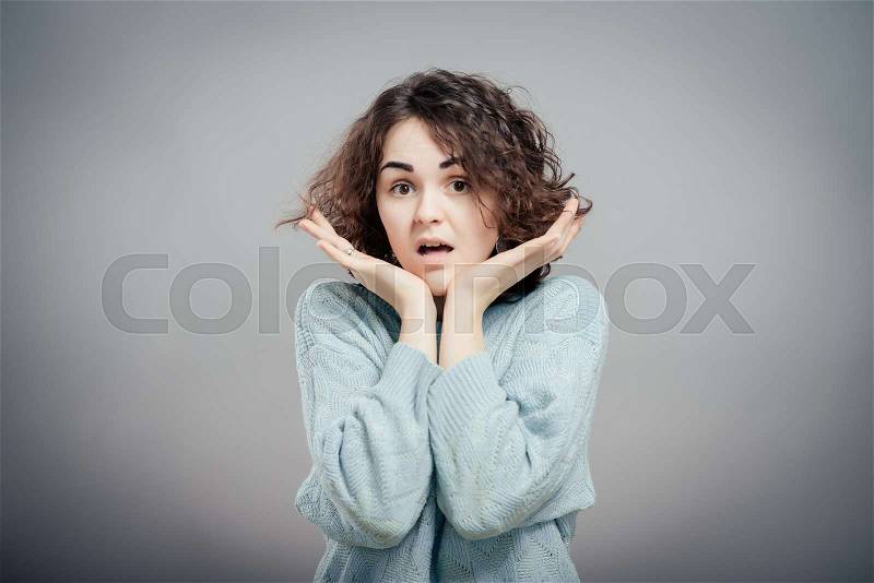 Smiling with open mouth and open palms, stock photo