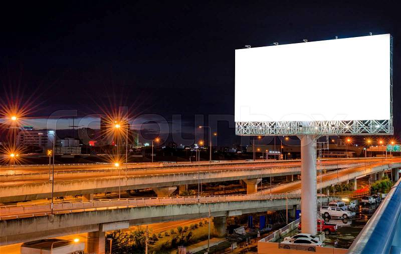 Blank billboard at night for advertisement, stock photo